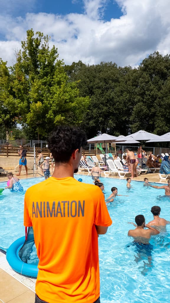 Entertainment team by the pool at Les Grottes de Roffy campsite